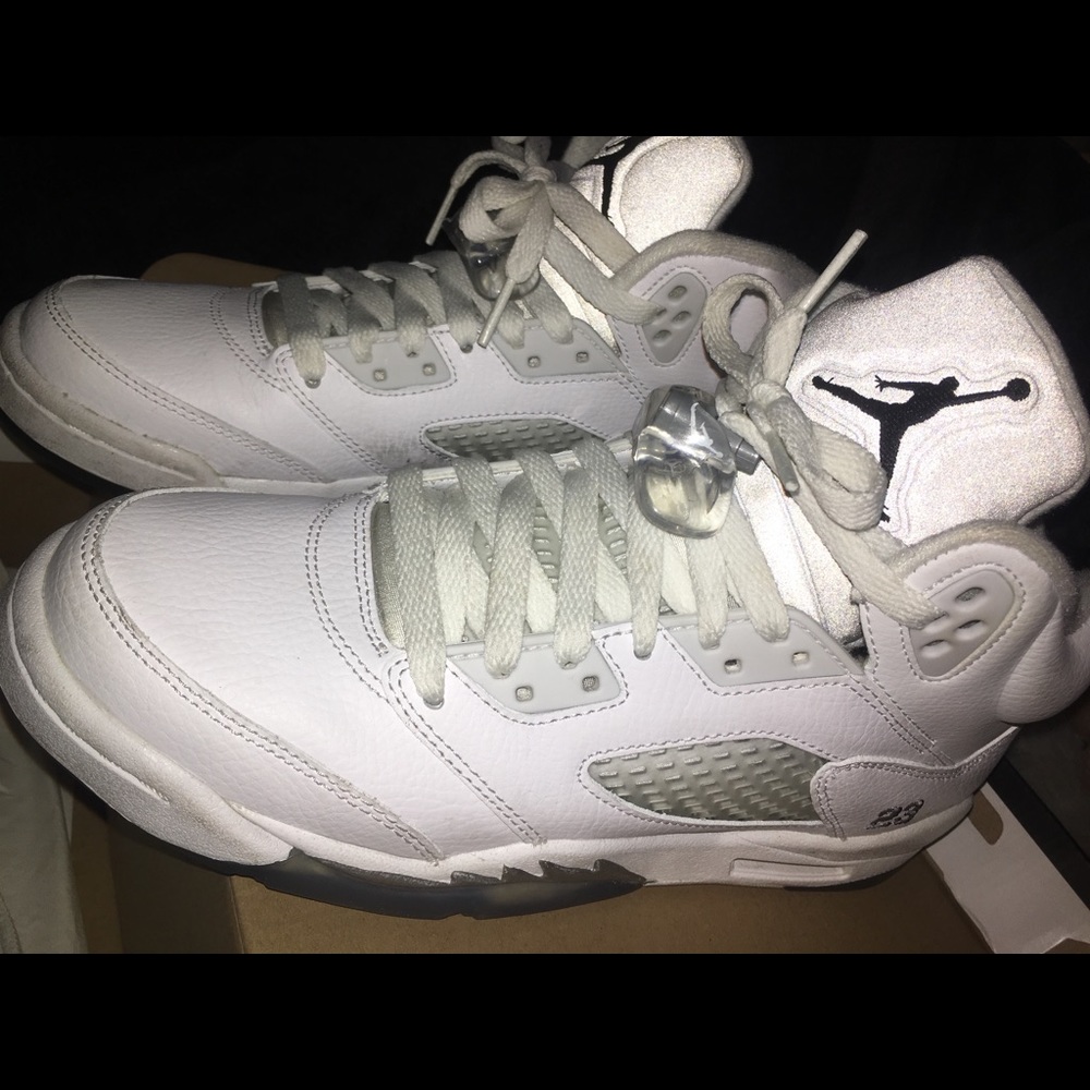 100% authentic Air Jordan 5 Retro. Size 7 youth.